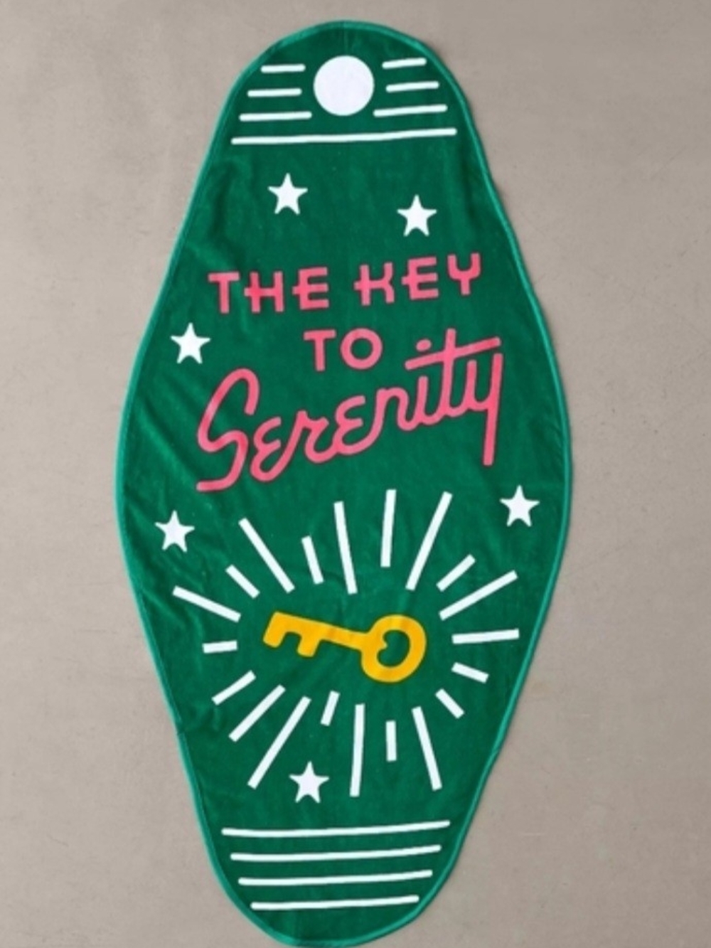 ban.do Green Beach Towel with Pink Typography and Yellow Key Graphic